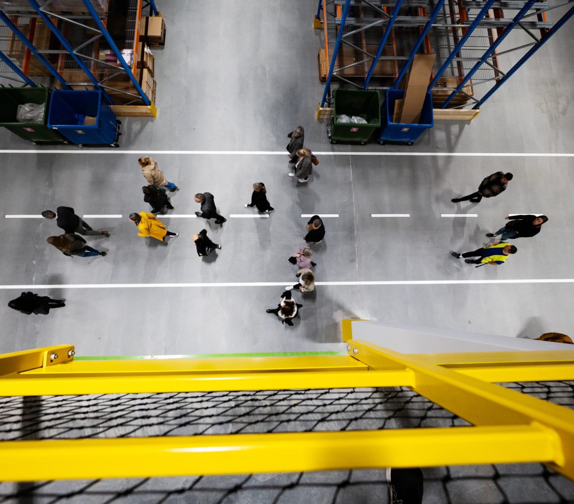View from above, people walking in an IKEA store