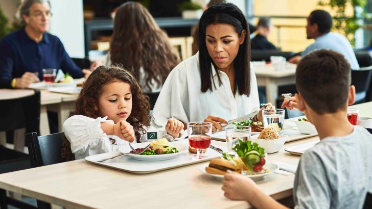 Family enjoying a meal at IKEA