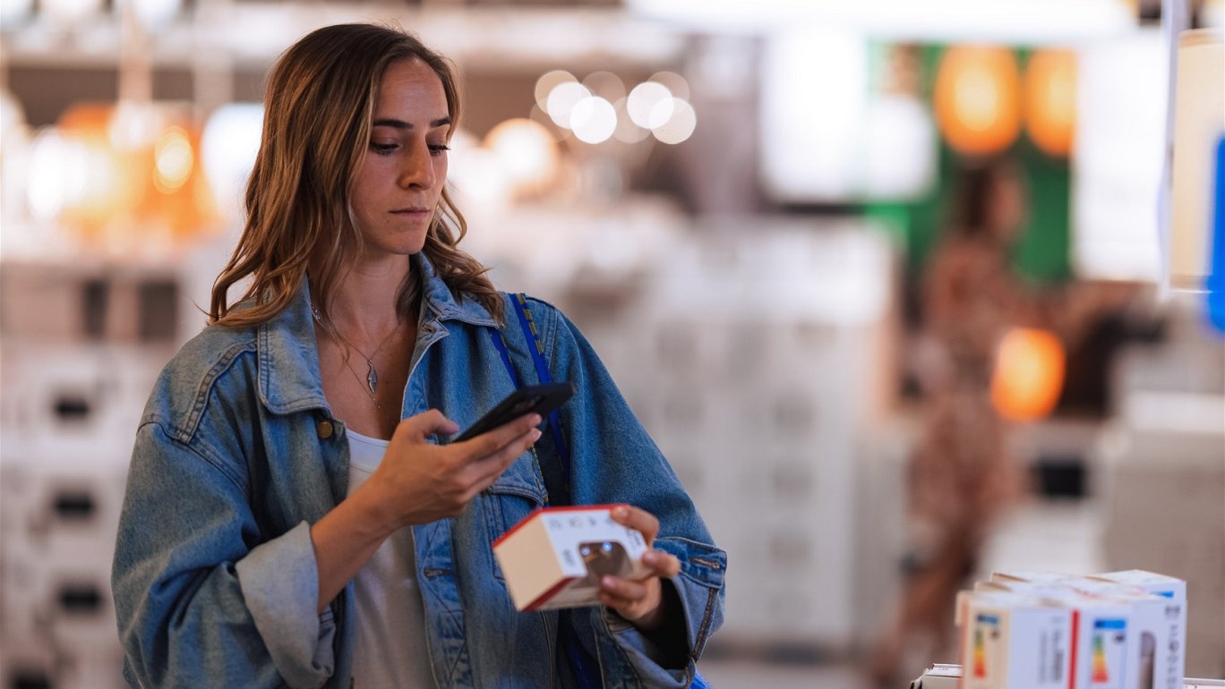 Customer scanning a product an IKEA store