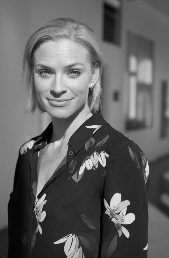 Black and white portrait of Jenna Grader