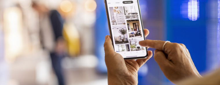 hand holding a mobile phone using the IKEA app