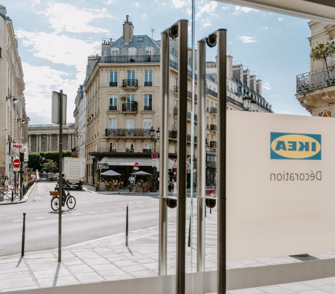 View of a city street from inside an IKEA store